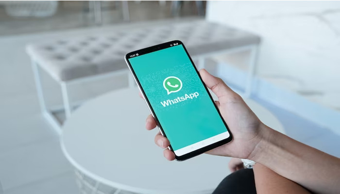 An undated image of a WhatsApp logo dispayed on phone. — Freepik
