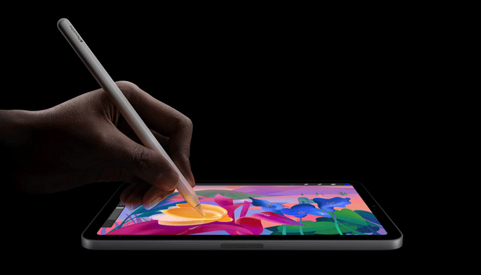 An undated image of person using apple pencil pro on iPad mini. — Apple