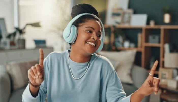 An undated image of a person enjoying using her headphone. — Shutterstock