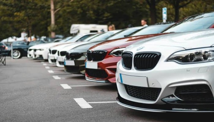 An undated image of parked cars. — Unsplash
