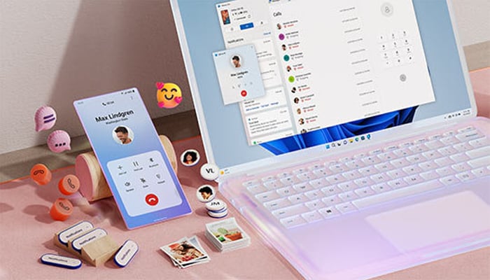 An undated image shows mobile linked to laptop. — Microsoft