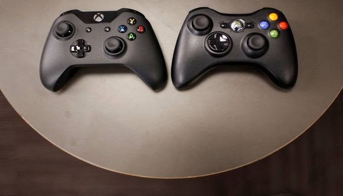 The new Xbox One controller (R), next to the previous controller during a press event unveiling Microsofts new Xbox One in Redmond, Washington May 21, 2013. — Reuters