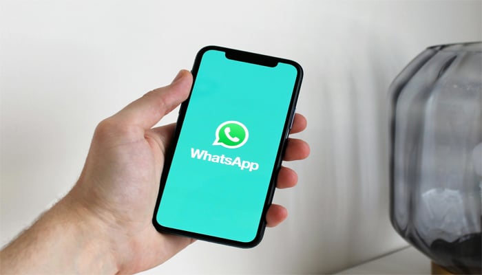 An undated image of WhatsApp logo displayed on smartphone. — Pexels