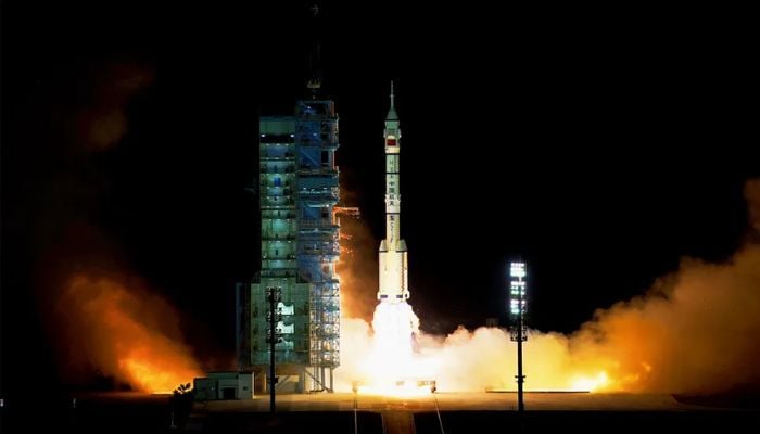 An image of the Chinese Long March 2F rocket launching the three Shenzhou 13 astronauts to the countrys Tiangong space station module Tianhe on Oct. 16, 2021, local time. — CASC
