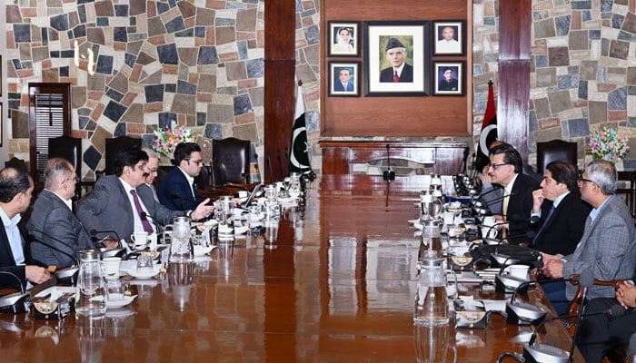 Sindh Chief Minister Syed Murad Ali Shah and Federal Minister for Railways Muhammad Hanif Abbasi discuss a multi-billion-rupee plan to modernise Sindh’s railway network during their meeting at the CM House on January 8, 2025. — Facebook@SindhCMHouse