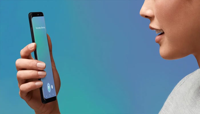 An undated image of person using Bixby. — Samsung