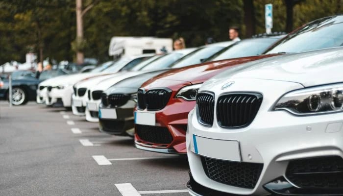 An undated image of parked cars. — Unsplash