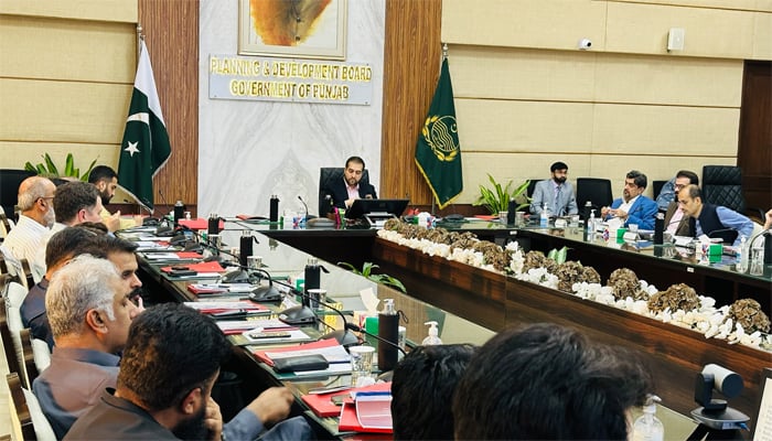 An undated image of a Planning & Development Board (Government of Punjab) meeting. — Planning & Development Board