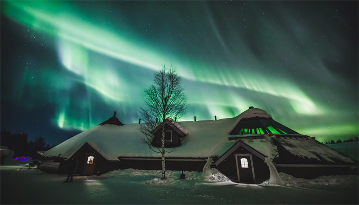 Aurora Borealis in sky over Arctic Snowhotel in Rovaniemi, Finland, February 28. — Reuters