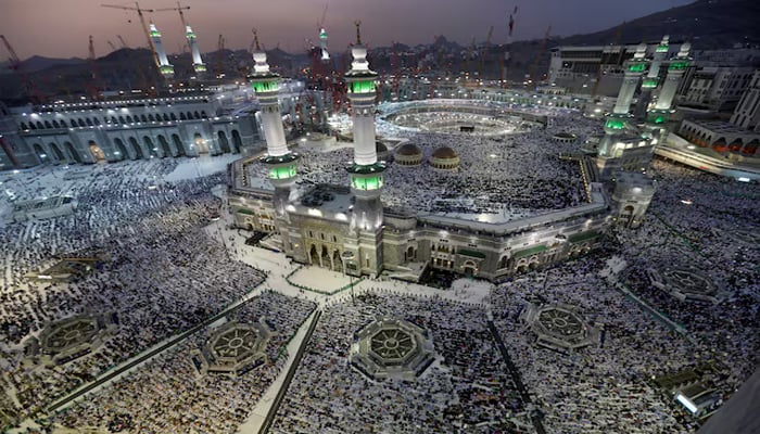 Muslim pilgrims pray around the holy Kaaba at the Grand Mosque, during the annual hajj pilgrimage in Mecca September 27, 2014. — Reuters