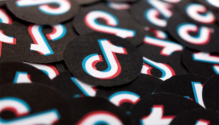 Printed TikTok logos are seen in this illustration taken February 15, 2022. — Reuters